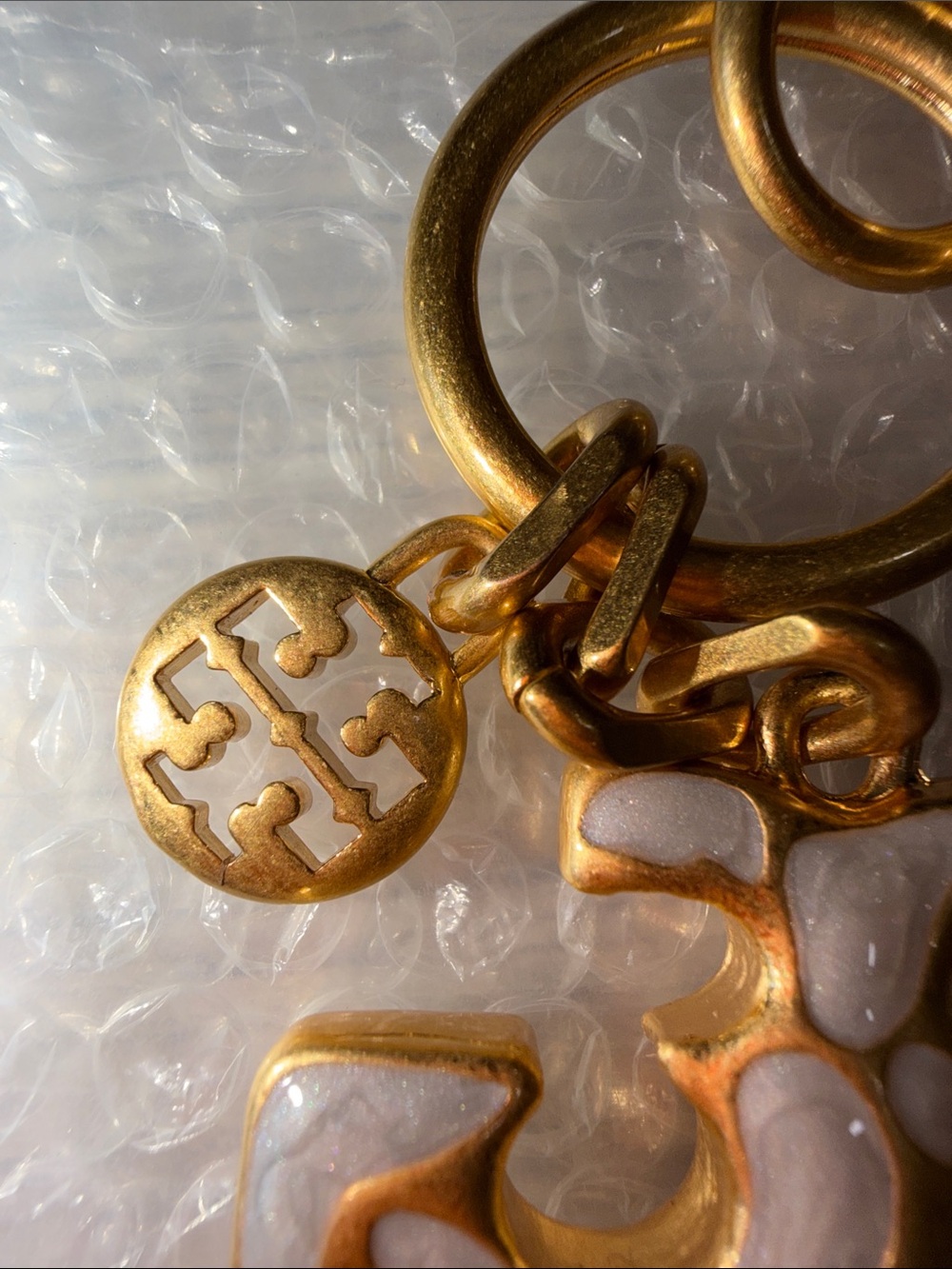 Tory Burch Gold-Tone Keychain with White Enamel Logo Charm - Picture 2 of 3